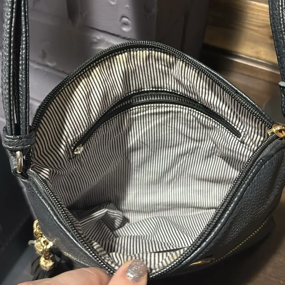 Rebecca & Rifka Black Adjustable Crossbody Bag with Tassel Zipper Detail